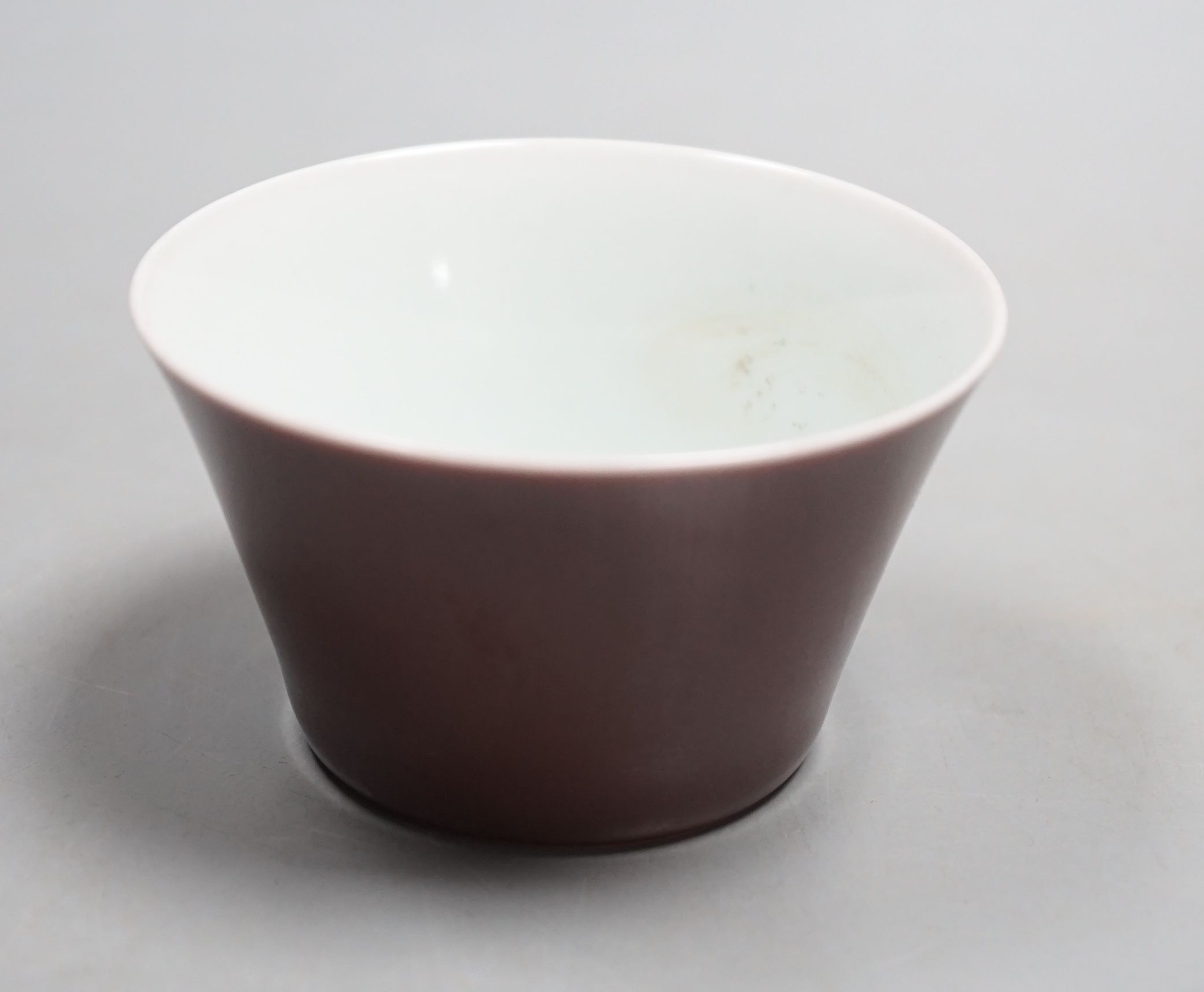 A Chinese sang-de-boeuf glazed cup